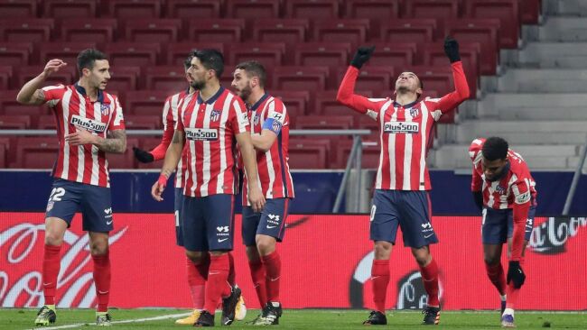 Atletico Madrid players celebrate after scoring