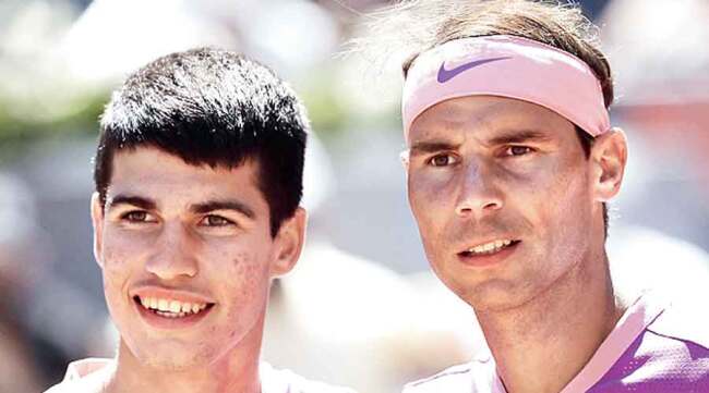 Carlos Alcaraz alongside Rafael Nadal