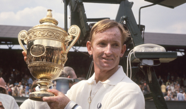 Rod Laver posing with his Wimbledon title in 1969.