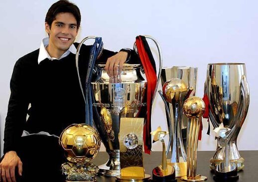 Kaka posing with his trophy collection