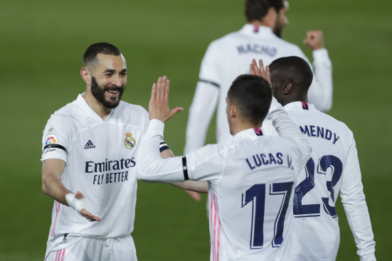 Karim Benzema celebrates with Lucas Vasquez