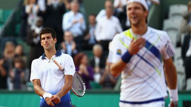 A dejected Djokovic after his stunning loss to Jurgen Melzer in the French Open 2010 Quarterfinals