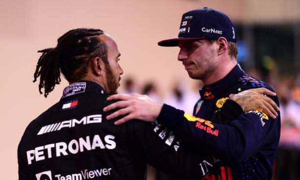 Lewis Hamilton congratulating Max Verstappen after a dramatic finale