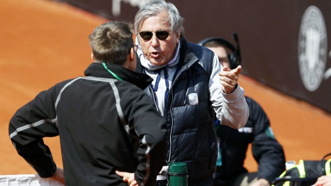 llie Nastase arguing with a match official