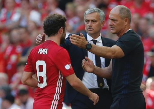 Juan Mata greeted by Jose Mourinho after being subbed off