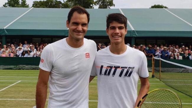 Roger Federer snapped alongside Carlos Alcaraz