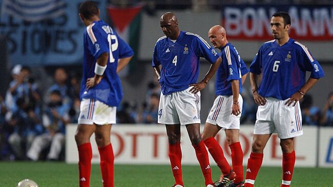The French Players look dejected and shocked