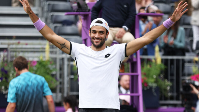Berrettini strikes a happy pose after triumphing in the finals of the Queen's Club Championships.