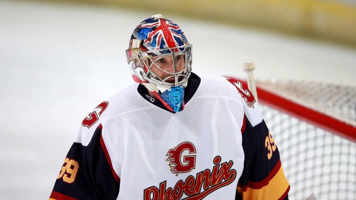 Petr Cech saves two penalties on man of the match ice hockey debut wearing  Chelsea and Arsenal badges on helmet