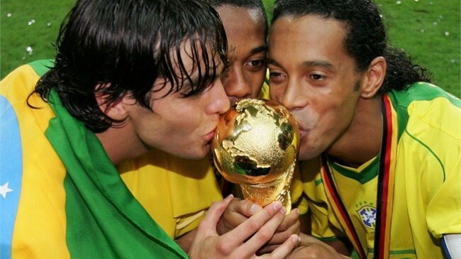 Kaka, Robinho and Ronaldinho with the World Cup trophy