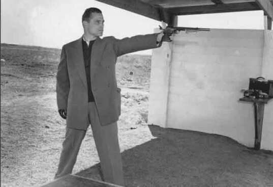 Karoly Takacs practicing with his left hand